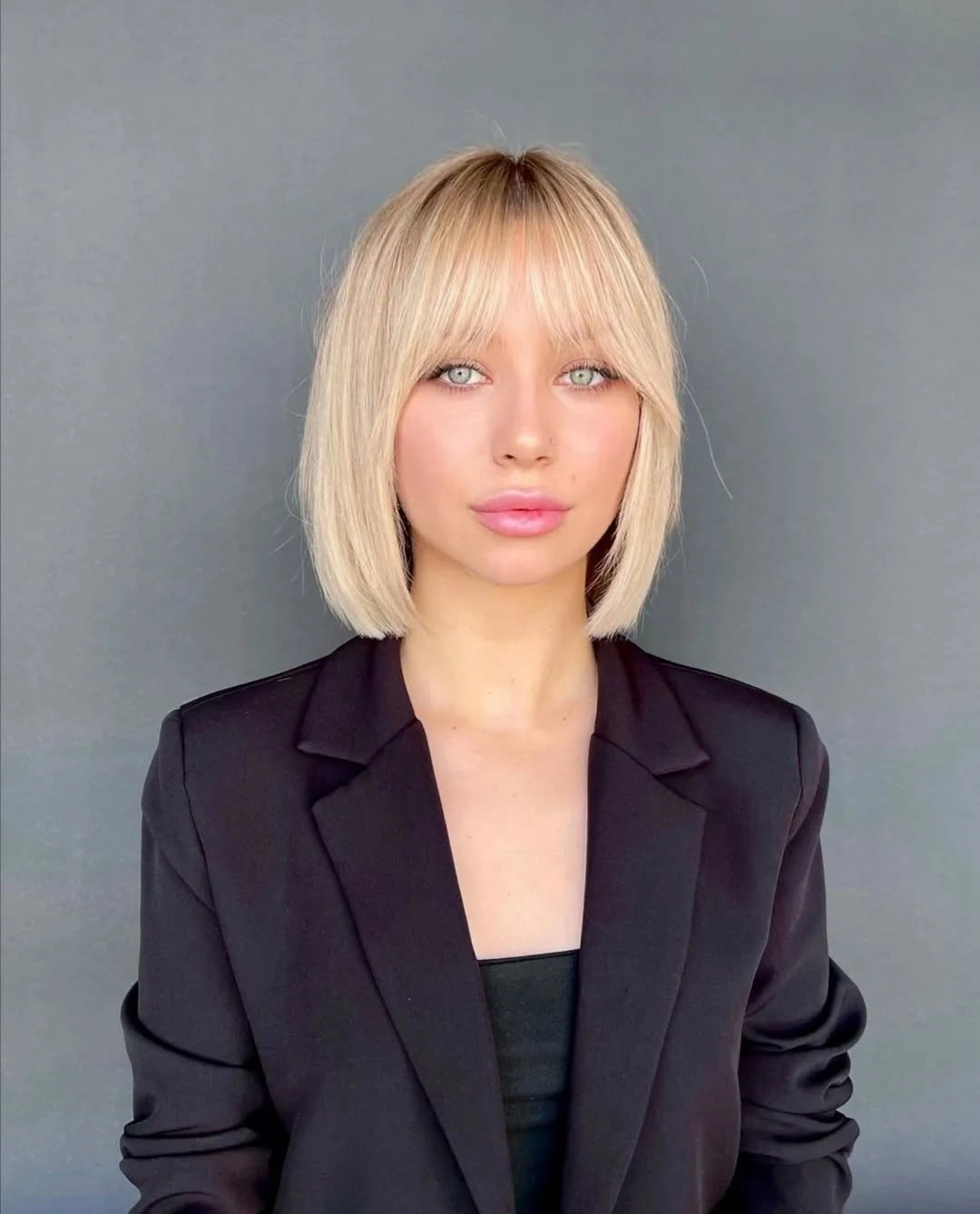 fall short haircuts 2026 Blunt Blonde Bob With Wispy Bangs