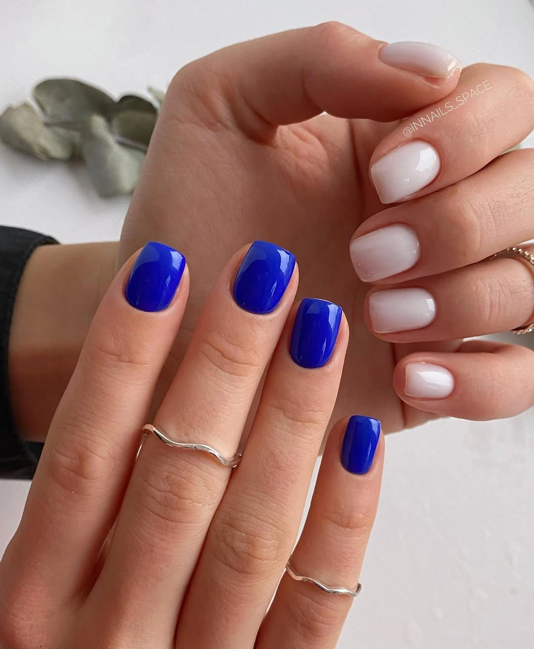 cobalt and white short nails on both hands