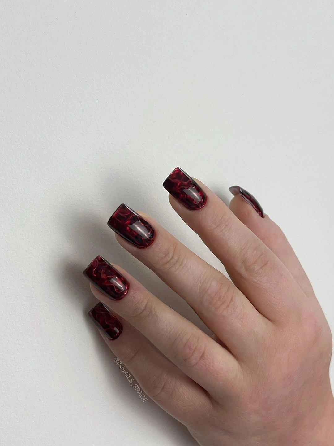 deep burgundy short square nails with glossy finish