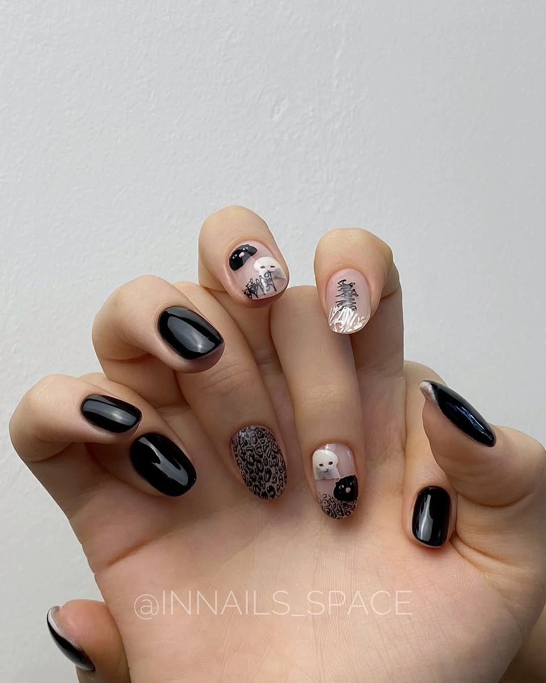 black short nails with nude silver accent art