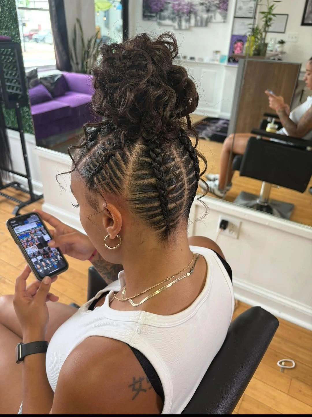 feed in braid hairstyles Curly High Bun with Intricate Feed-In Details