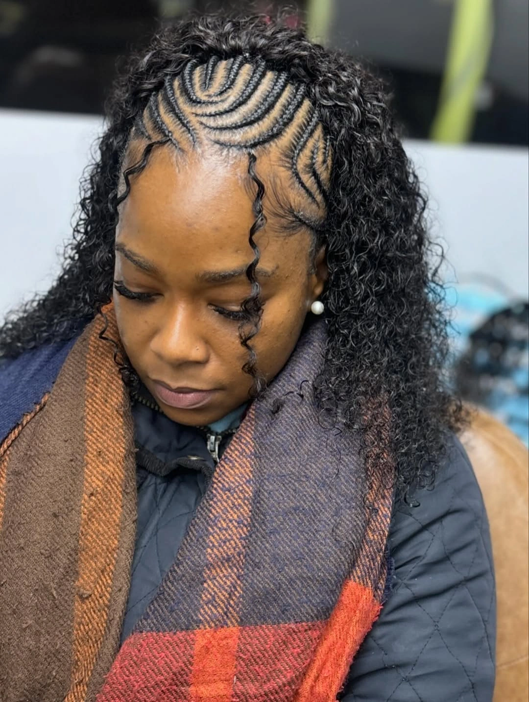 feed in braid hairstyles Curly Feed-In Braids with Artistic Swirl Cornrows