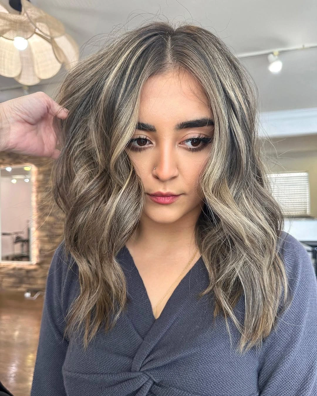 full head babylights blonde on brown hair Face-Framing Blonde Babylights with Soft Lived-In Waves