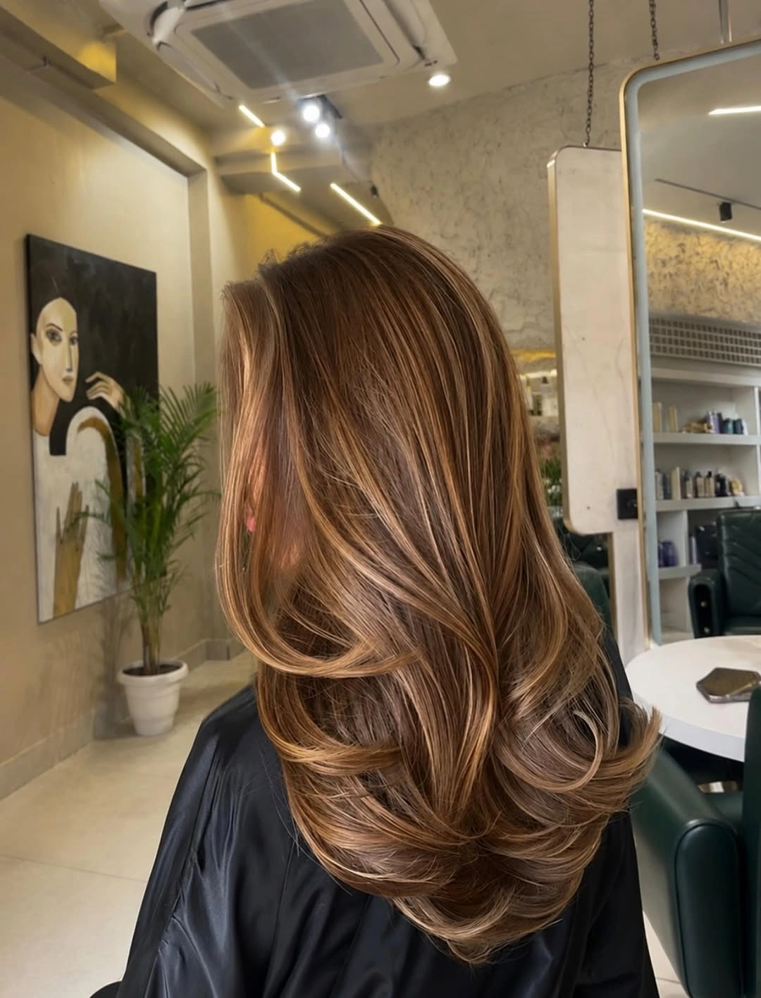 Hair Lowlights: Color Ideas and Inspiration Soft Caramel Ribbons That Make Long Brown Hair Glow