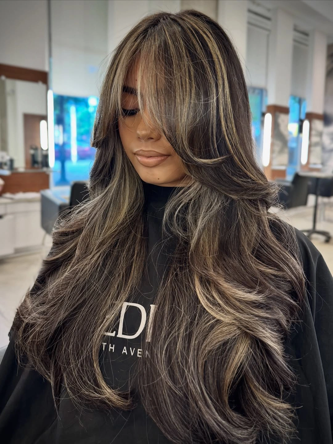 Hair Lowlights: Color Ideas and Inspiration Face-Framing Blonde Lowlights with Luxurious Smoky Contrast