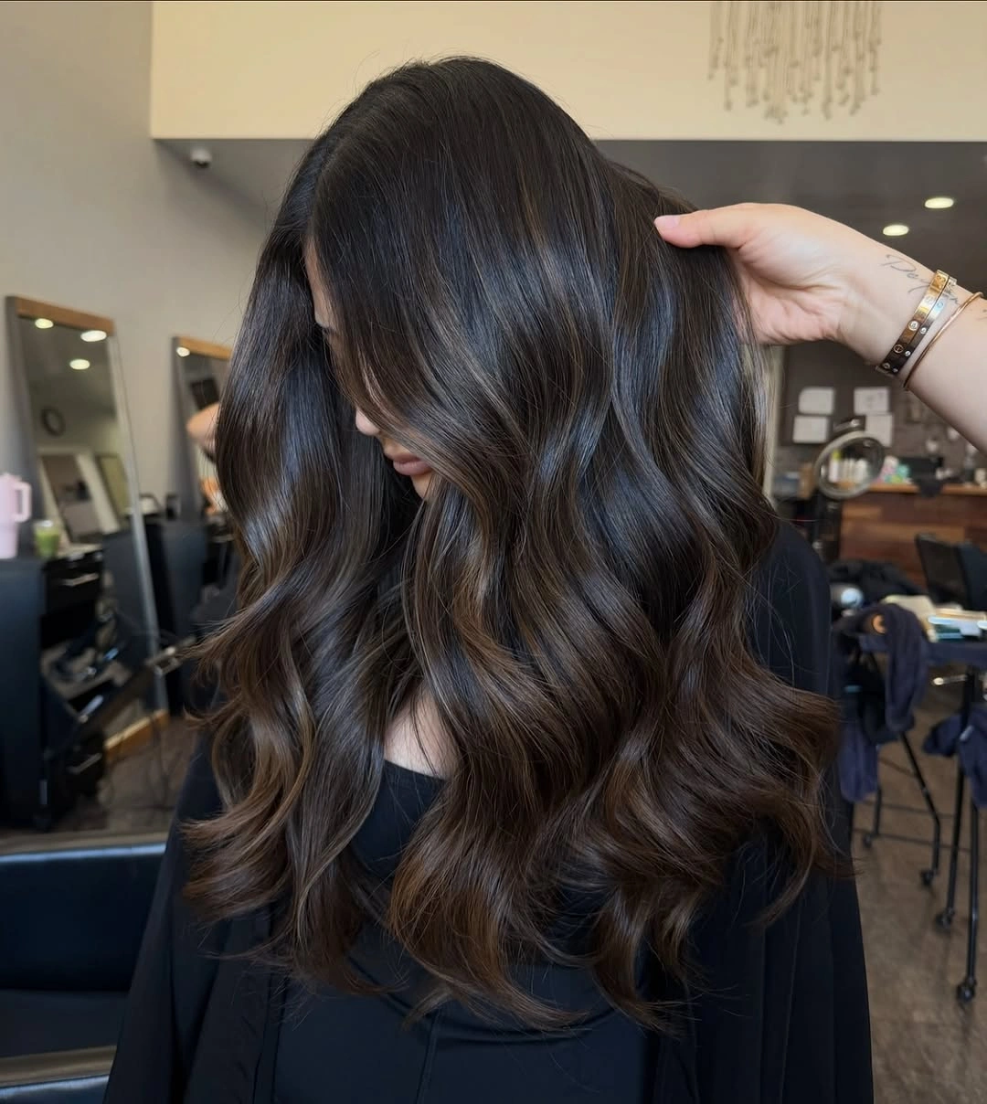 Hair Lowlights: Color Ideas and Inspiration Rich Espresso Lowlights for Glossy Dimensional Brunette Hair