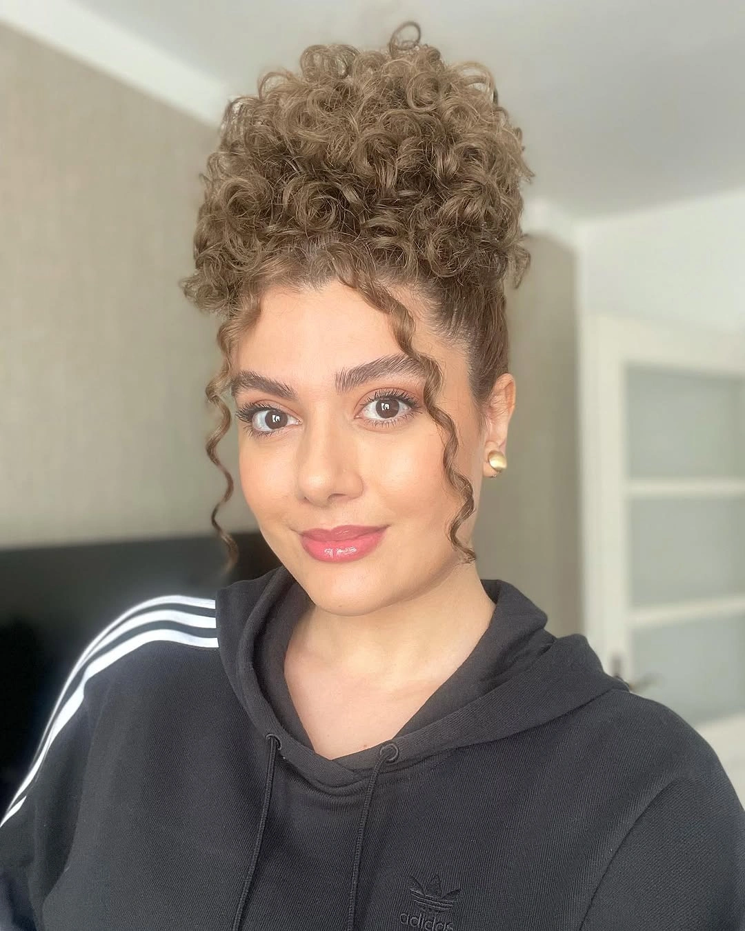 heatless curls hairstyle Elegant Curly Updo with Soft Face-Framing Spirals