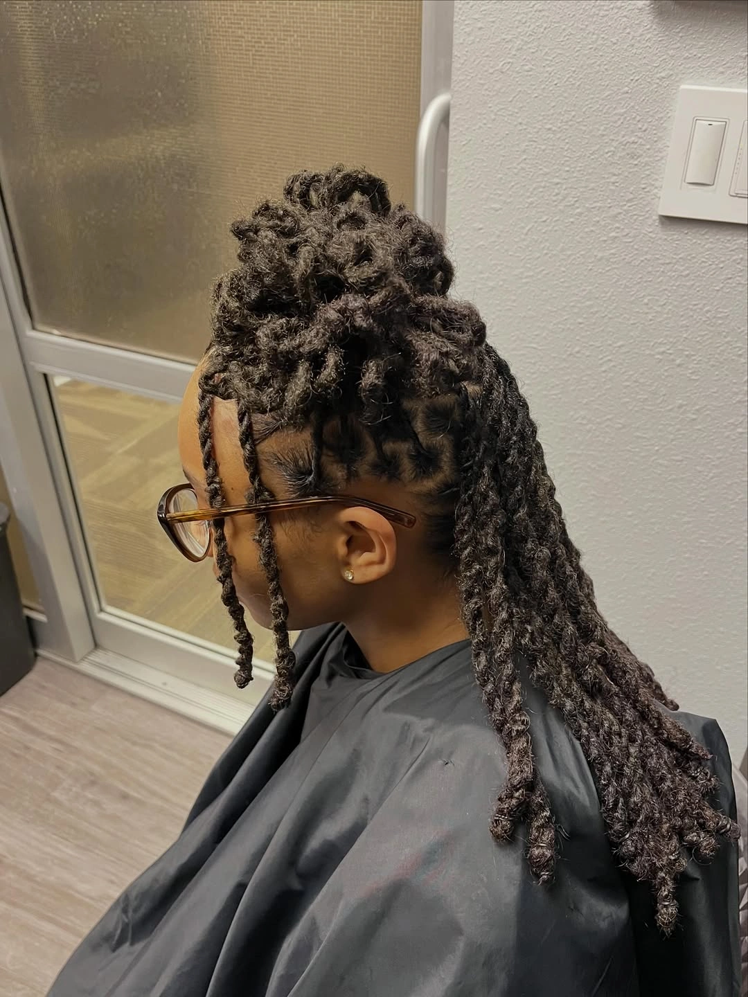 locs hairstyles for black women Half-Up Barrel Loc Bun with Defined Front Pieces