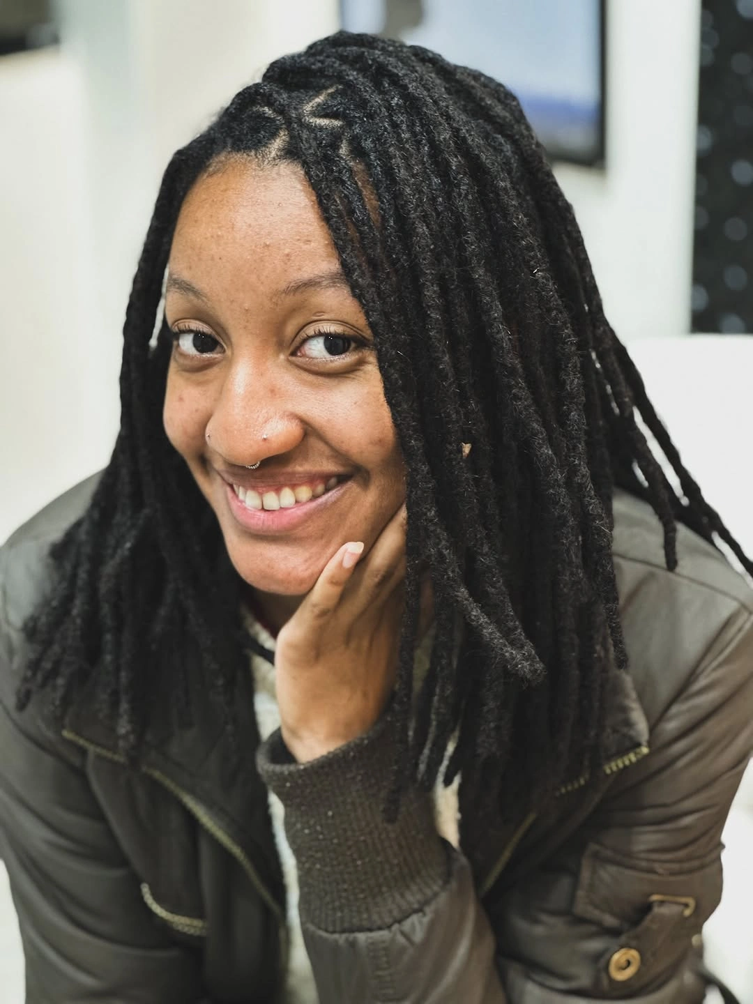 locs hairstyles for black women Classic Middle-Part Locs with Everyday Elegance