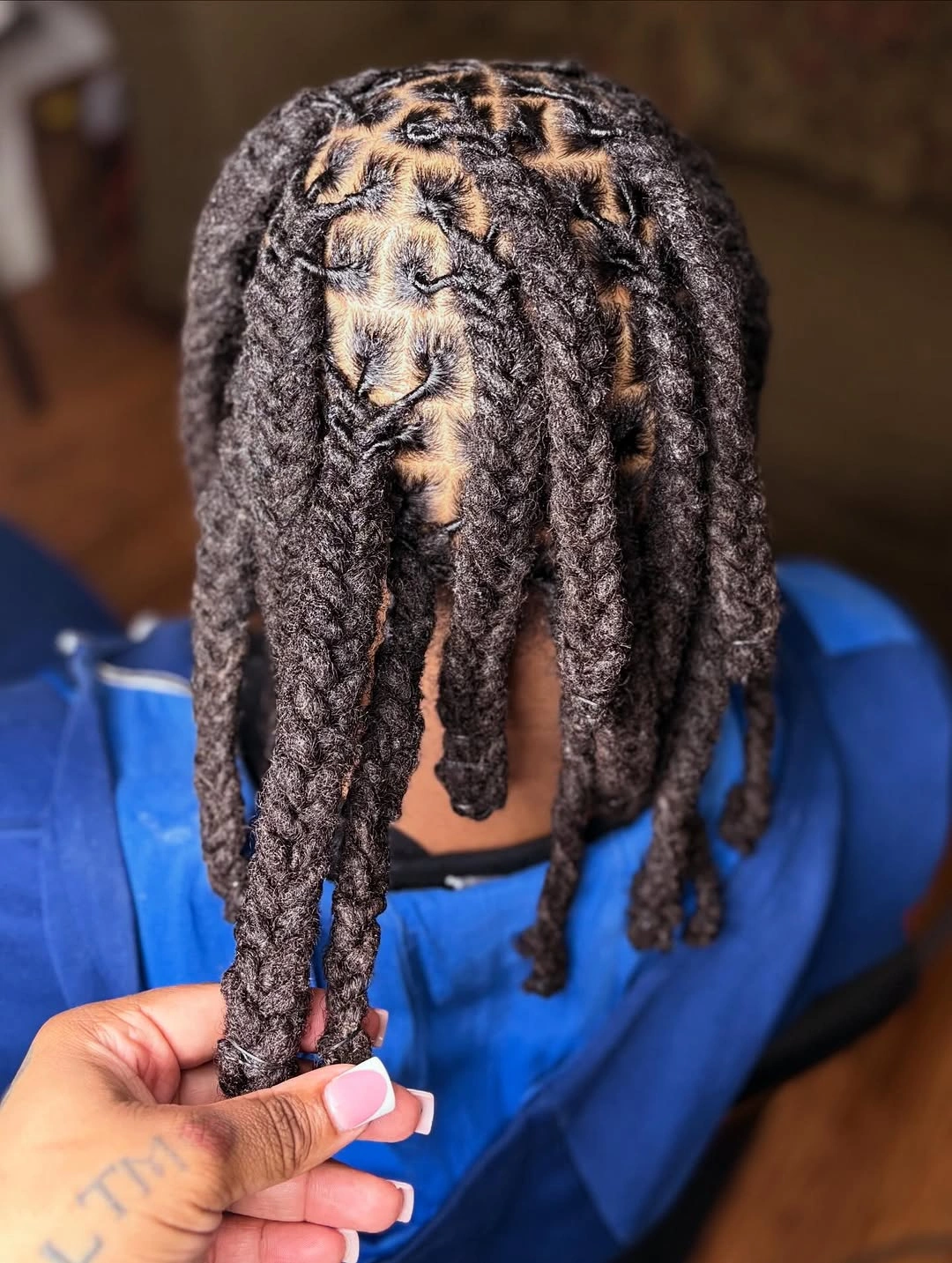 locs hairstyles for black women Creative Star-Part Locs with Sculptural Detail