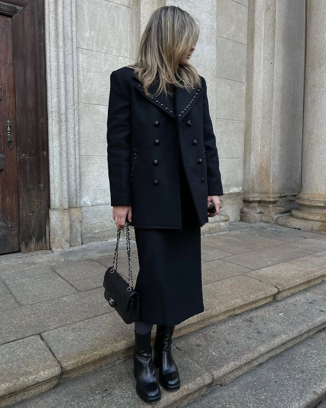 midi skirt fall outfit 2026 Monochrome Black Midi Skirt with a Tailored Statement Coat