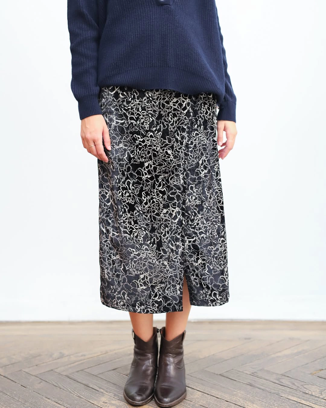 midi skirt fall outfit 2026 Black Floral Midi Skirt with a Navy Knit for Everyday Fall Style
