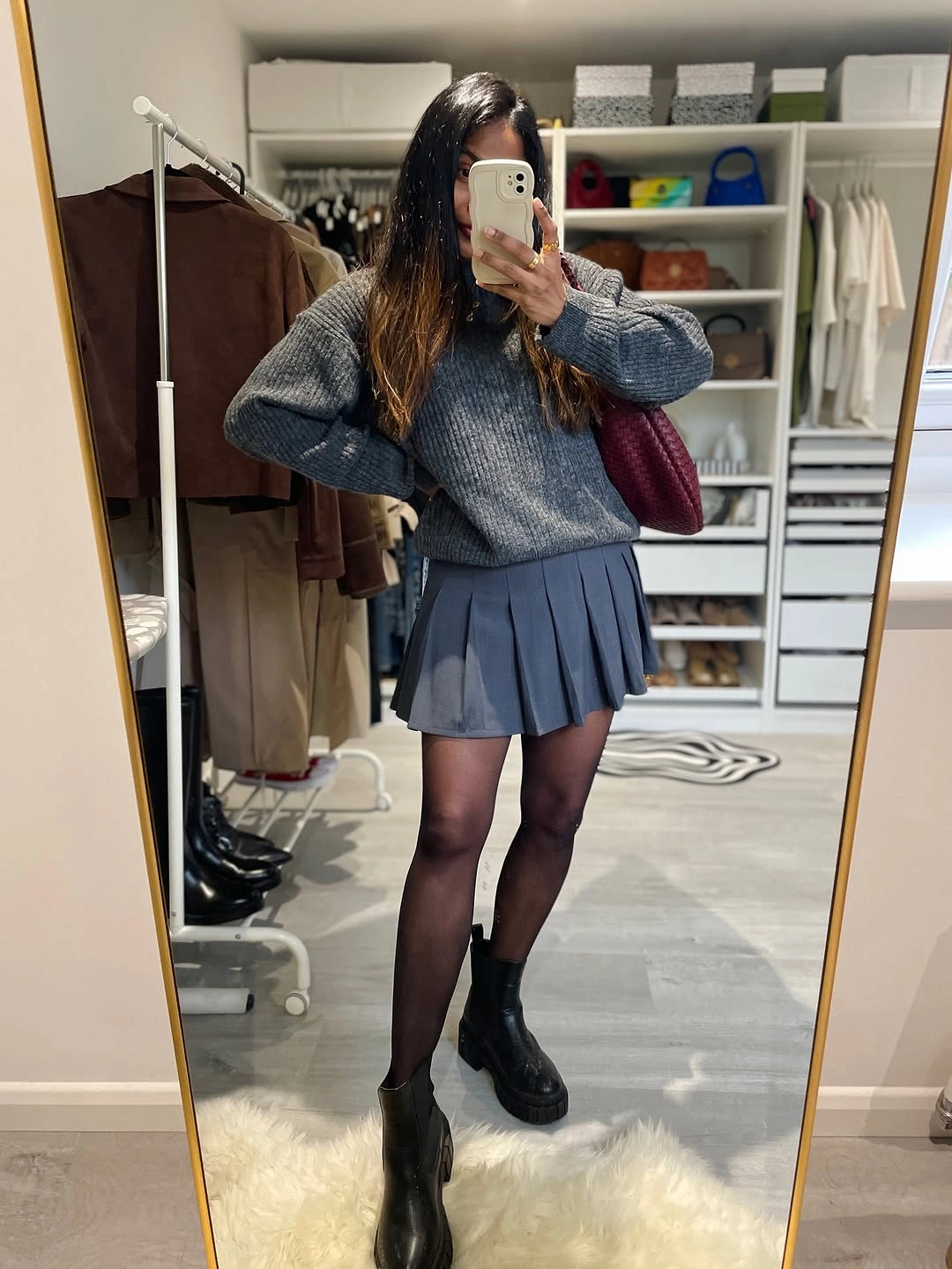 September fashion trends 2026 Gray Sweater With Pleated Mini Skirt