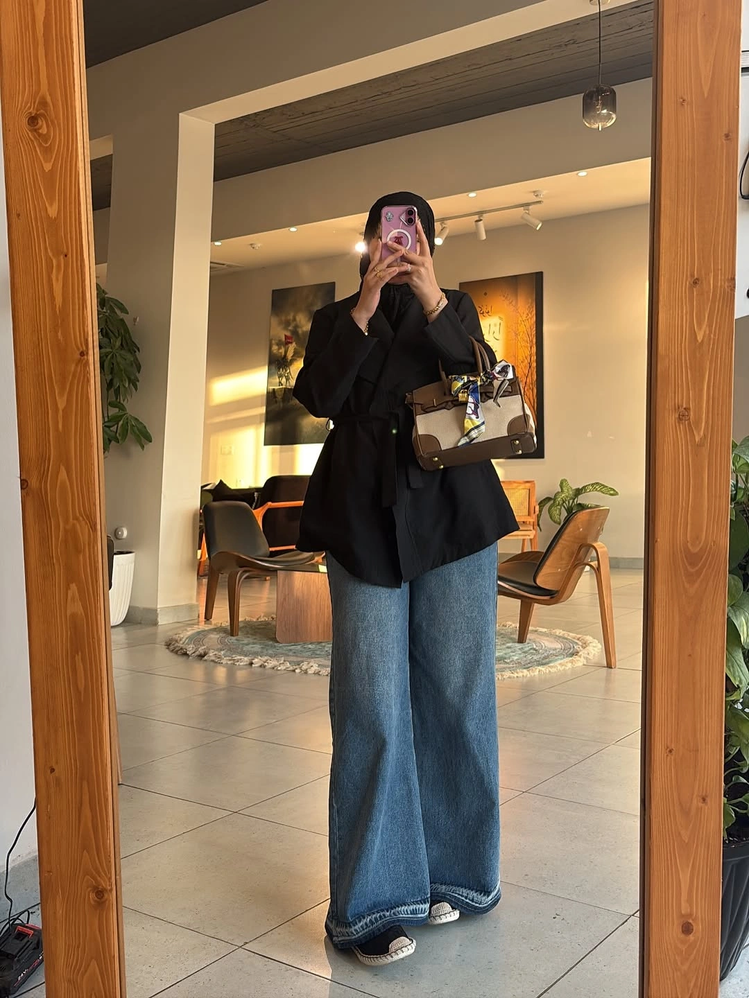 September fashion trends 2026 Black Blouse With Wide Blue Denim