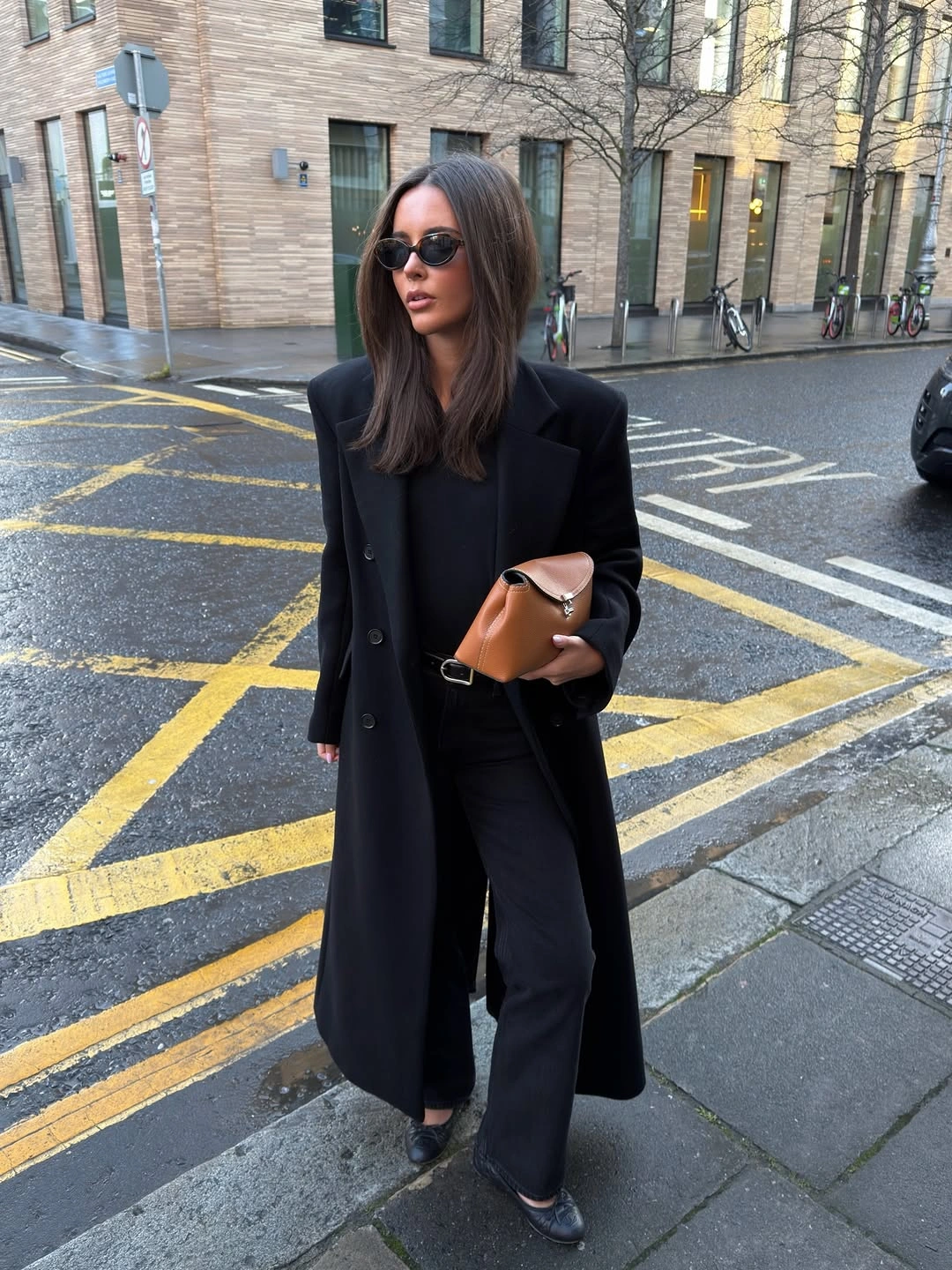 September fashion trends 2026 Black Long Coat With Tailored Separates