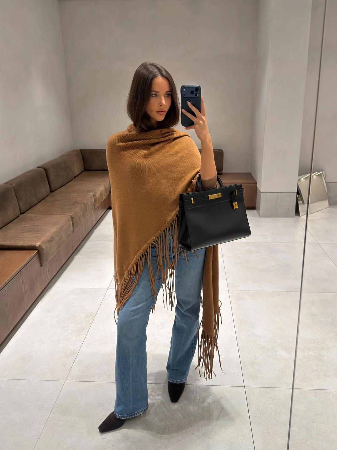 September fashion trends 2026 Camel Fringe Poncho With Straight Denim