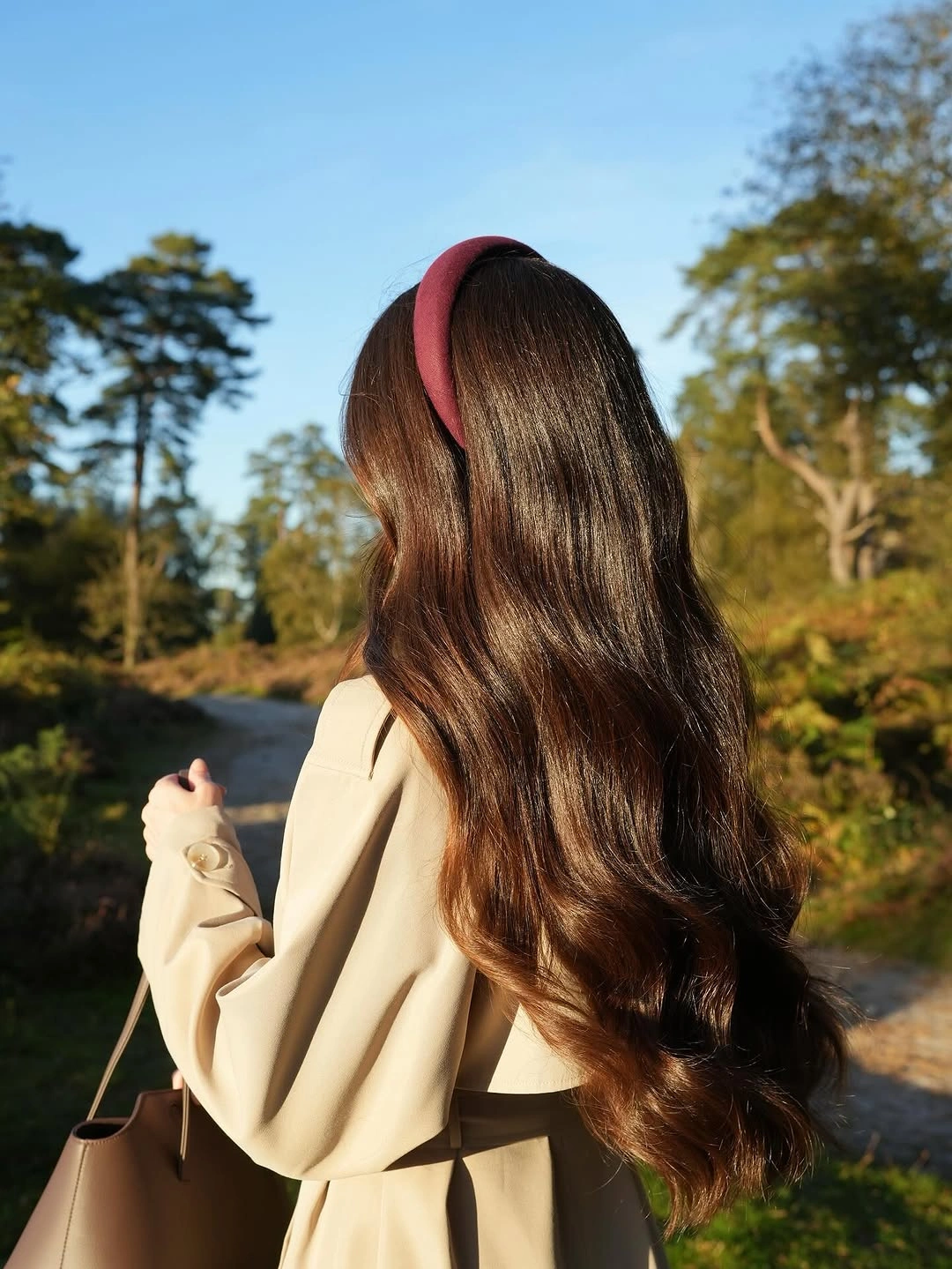 September hairstyles ideas 2026 Red Headband With Long Dark Waves