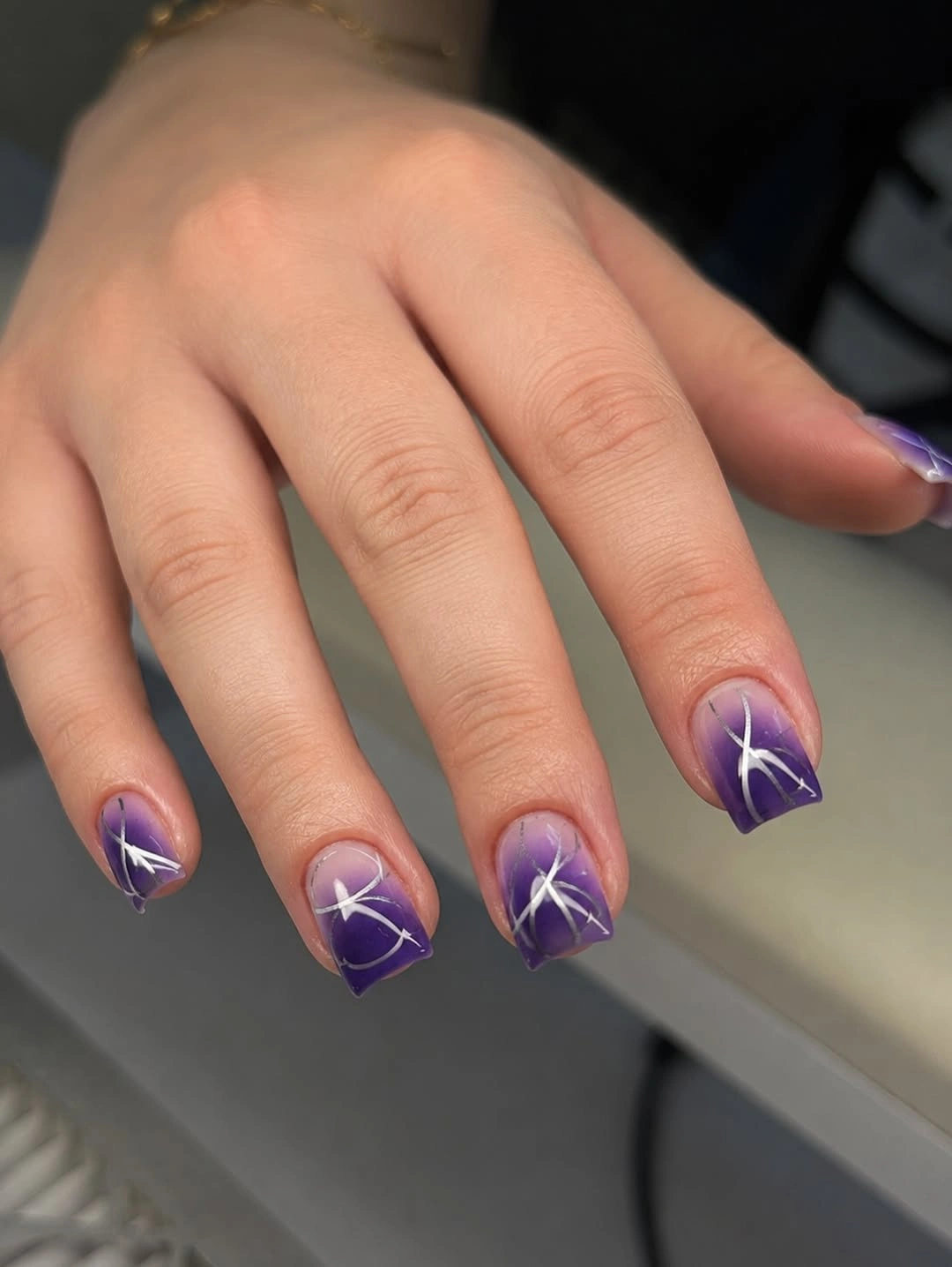 September nail art ideas 2026 Purple French Tips With White Starburst Lines