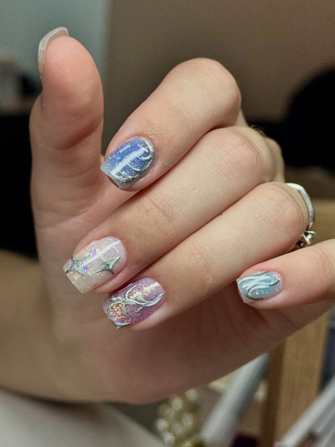 September nail art ideas 2026 Pastel Blue And Pink Abstract Shell Nails