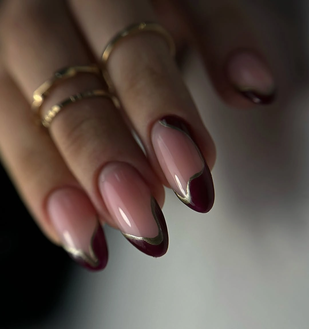 September nail designs 2026 Burgundy French Almond Nails On A Nude Base