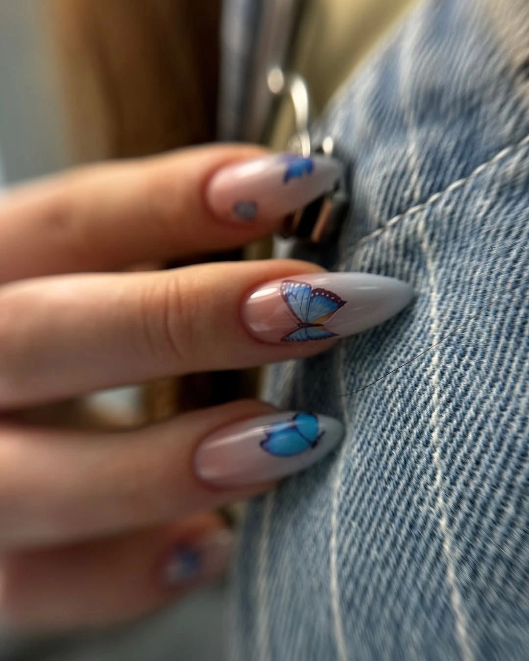 September nail designs 2026 Blue Butterfly Accents On Nude Almond Nails