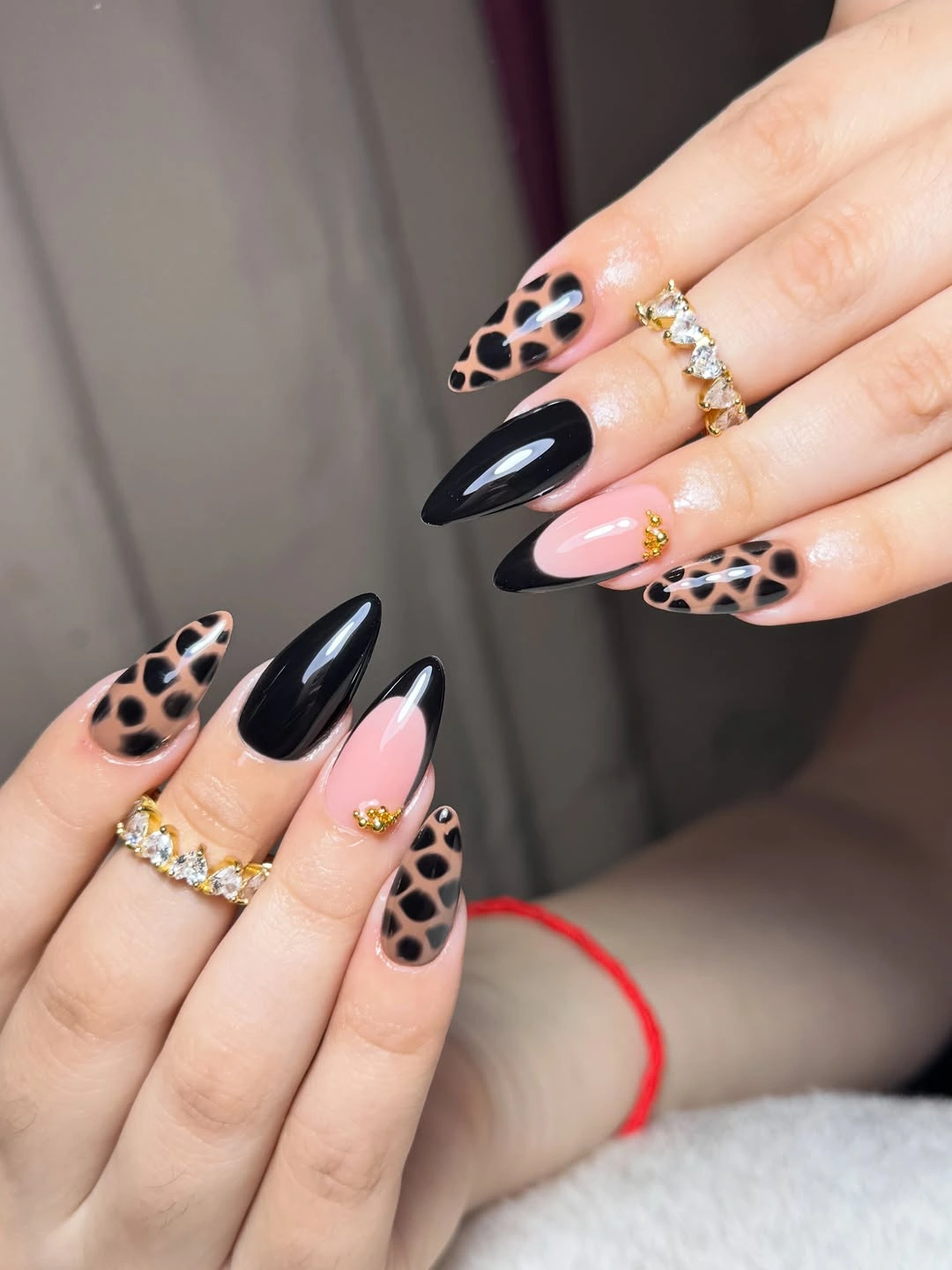September nails color 2026 Black Almond Nails With Leopard Print Accents