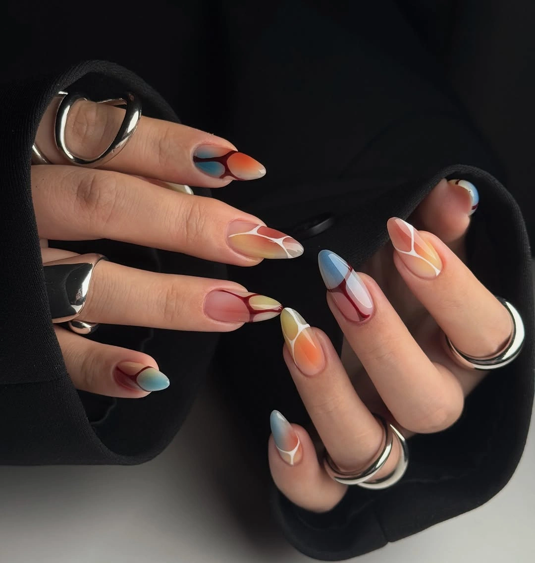 September nails color 2026 Muted Multicolor French Tips On Almond Nails