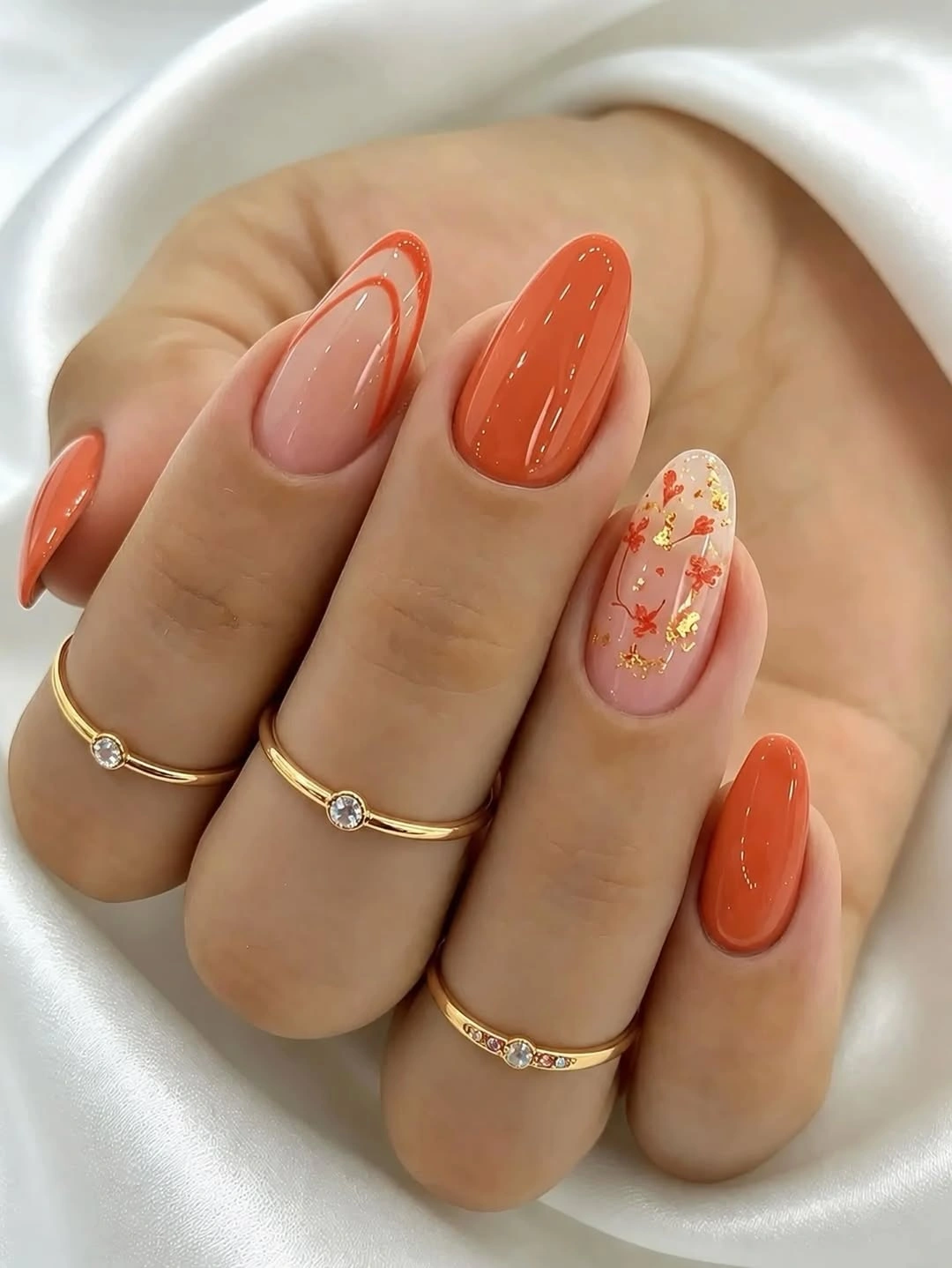 September nails color 2026 Orange Coral Nails With Floral Accent Detail