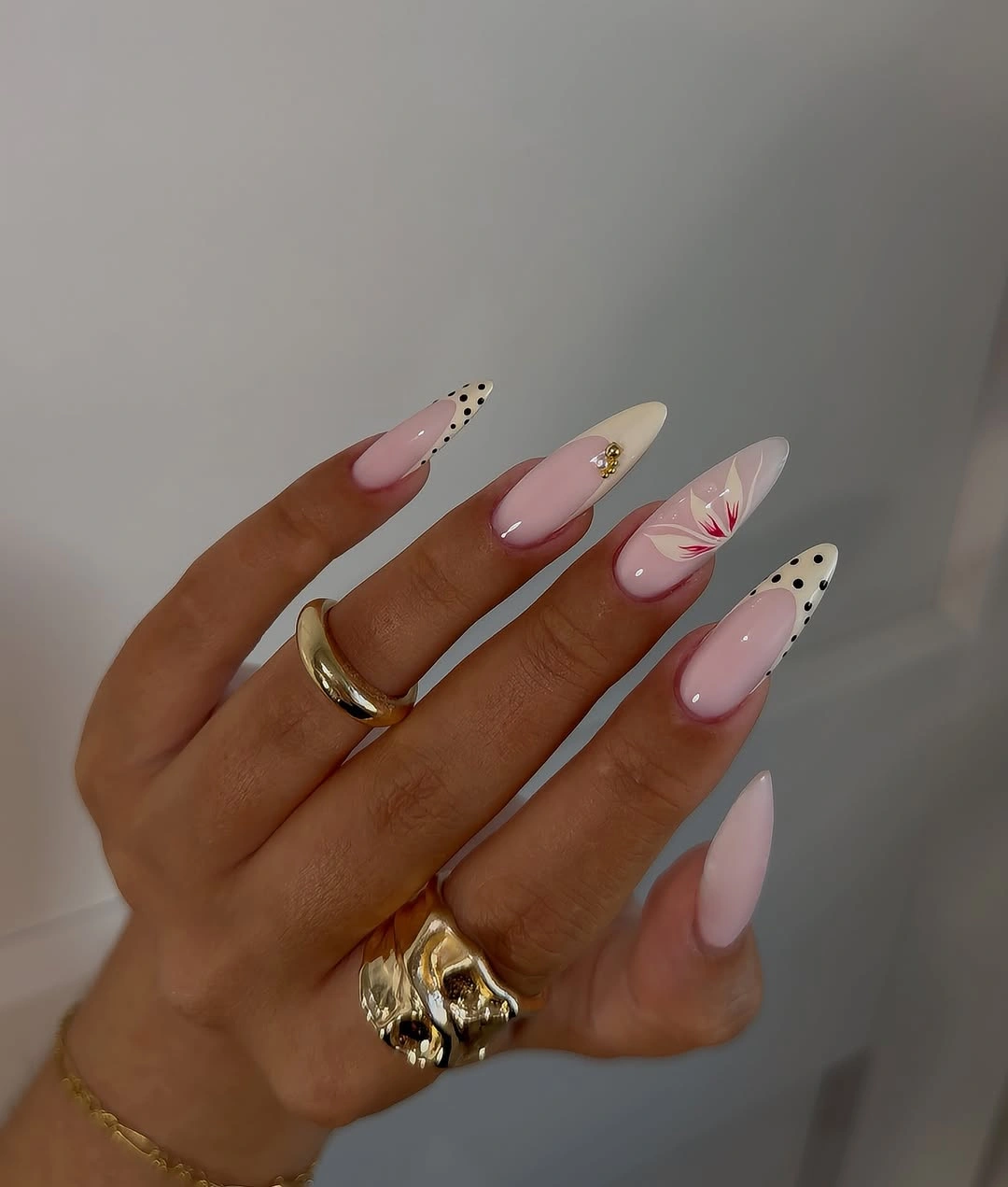 September nails color 2026 Pastel Almond Nails With Dots And Fine Red Lines