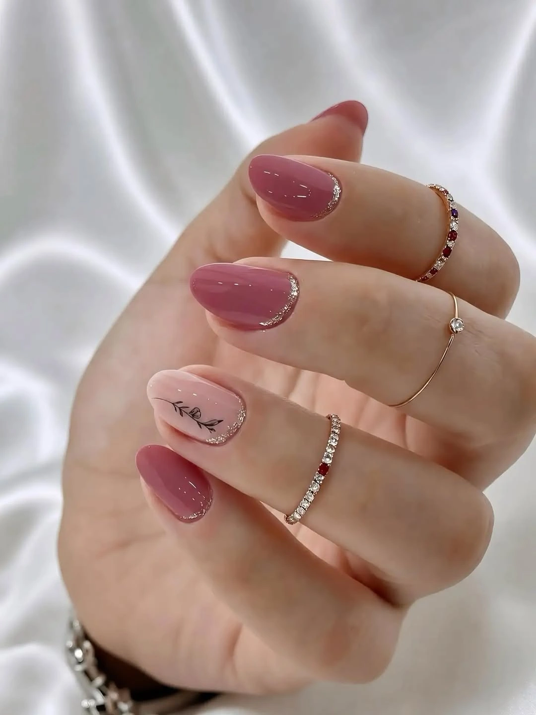 September nails color 2026 Mauve Glossy Nails With A Soft Nude Accent