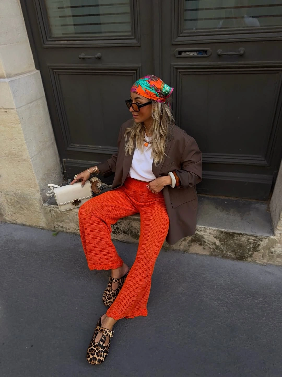September outfits ideas 2026 Orange Trousers With Brown Blazer And Headscarf