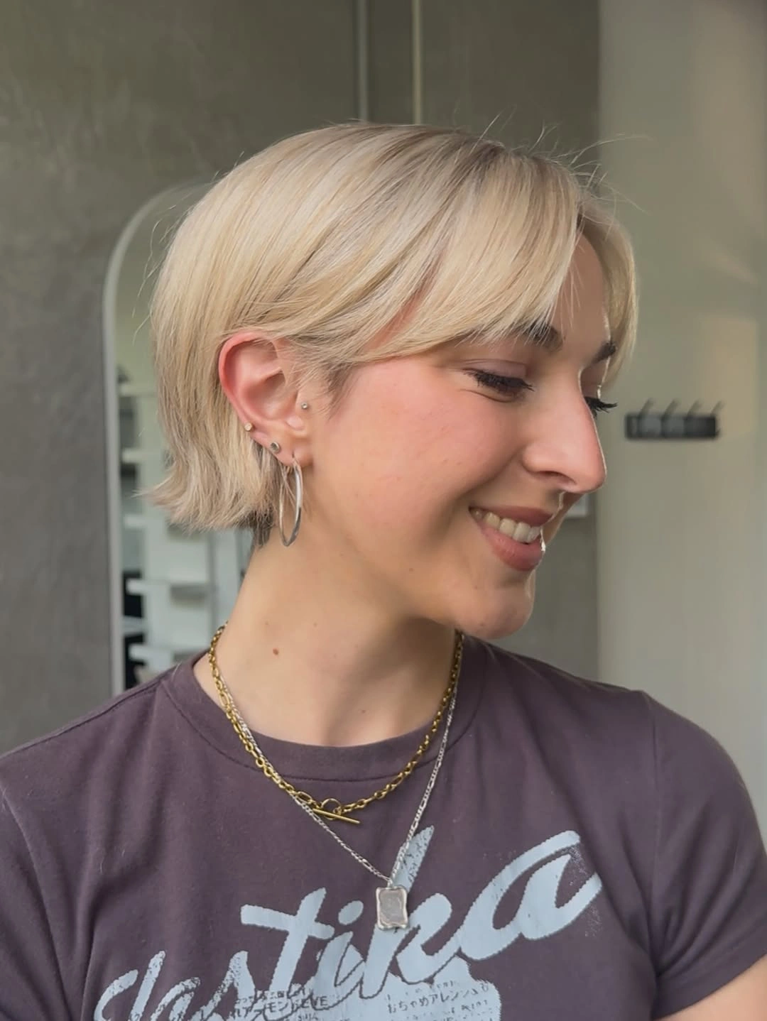 short bobbed hairstyle Soft Blonde Micro Bob with Curtain Layers