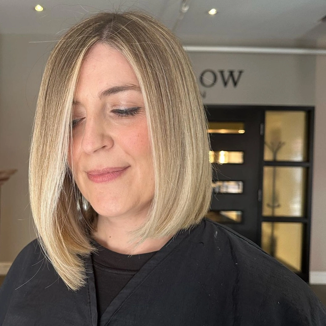 short bobbed hairstyle Precision Blonde Bob with Glass-Like Shine
