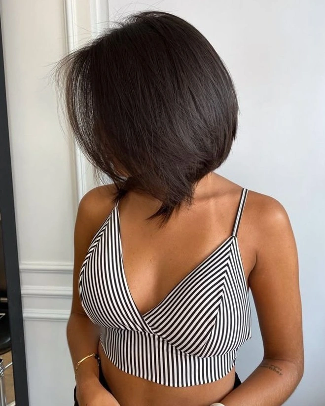short bobbed hairstyle Elegant Angled Bob with Feathered Front Layers