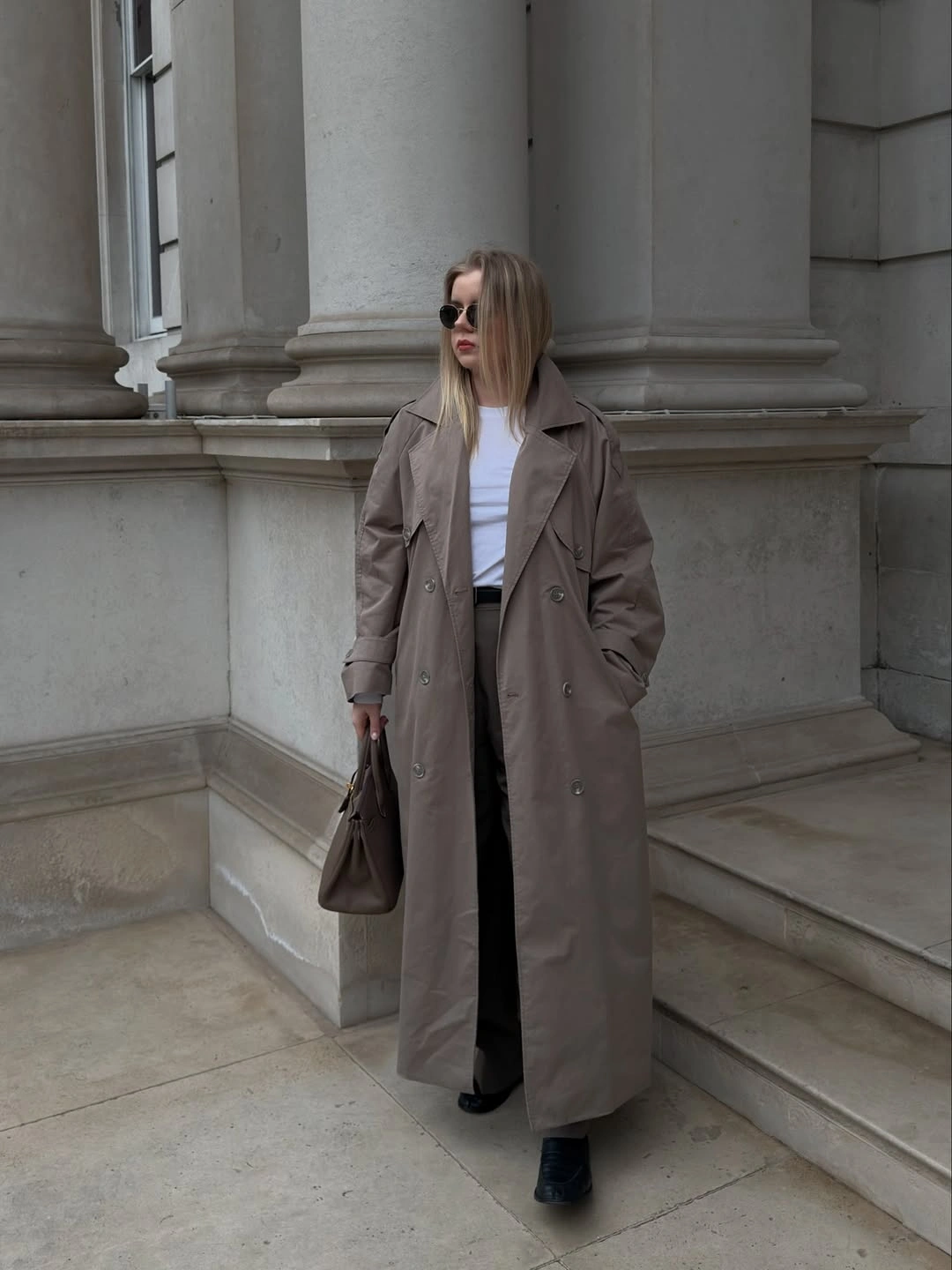 Trench coat fall outfits 2026 Soft Taupe Minimalism for Everyday City Dressing