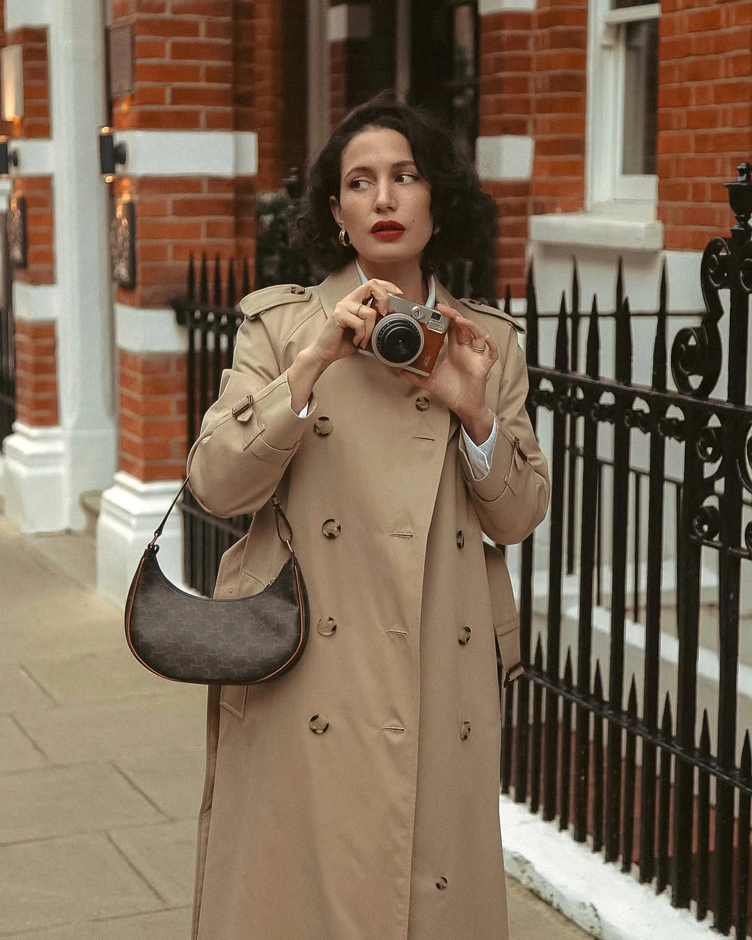 Trench coat fall outfits 2026 Classic London Neutral with Vintage Camera Charm