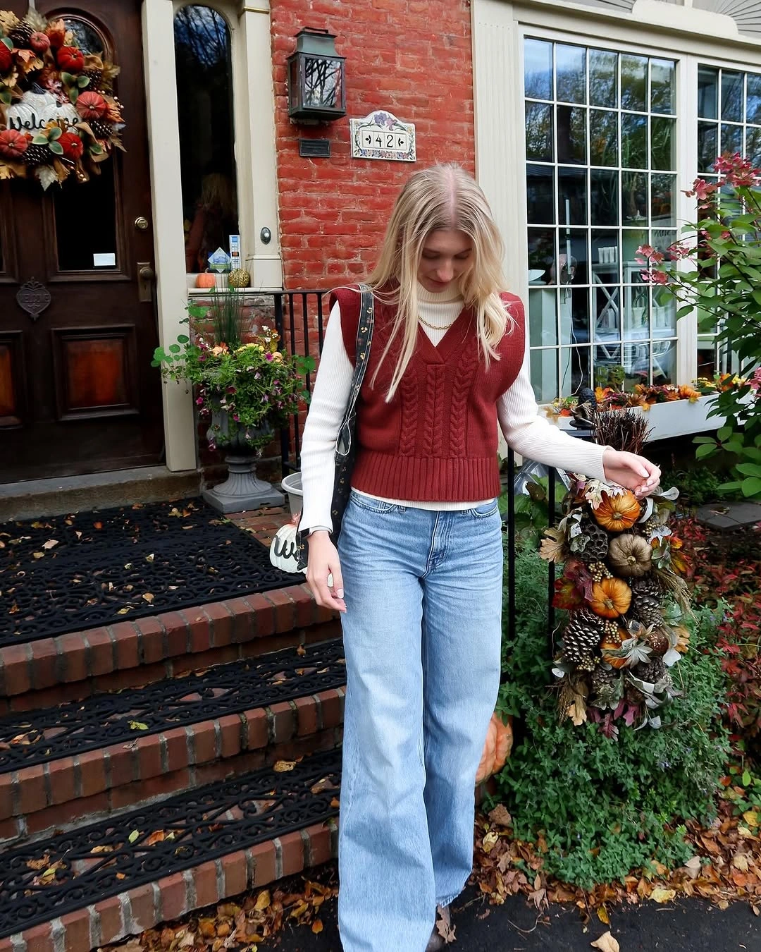 wide leg jeans outfit fall 2026 Cozy Sweater Vests Are Back for Fall Denim