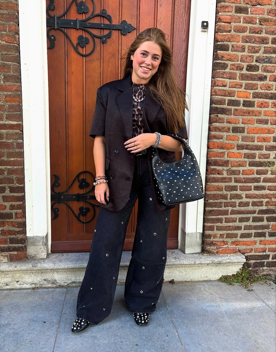 wide leg jeans outfit fall 2026 Dark Tailoring Gives Wide Leg Jeans Evening Appeal