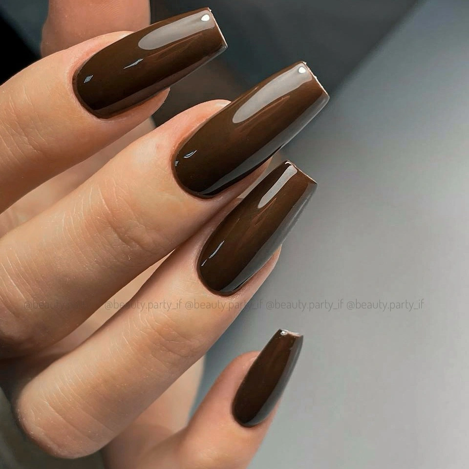 Medium square nails with soft brown and blush contrast