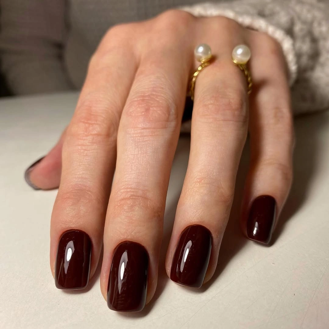 Long square nails with brown black cream and pink bands