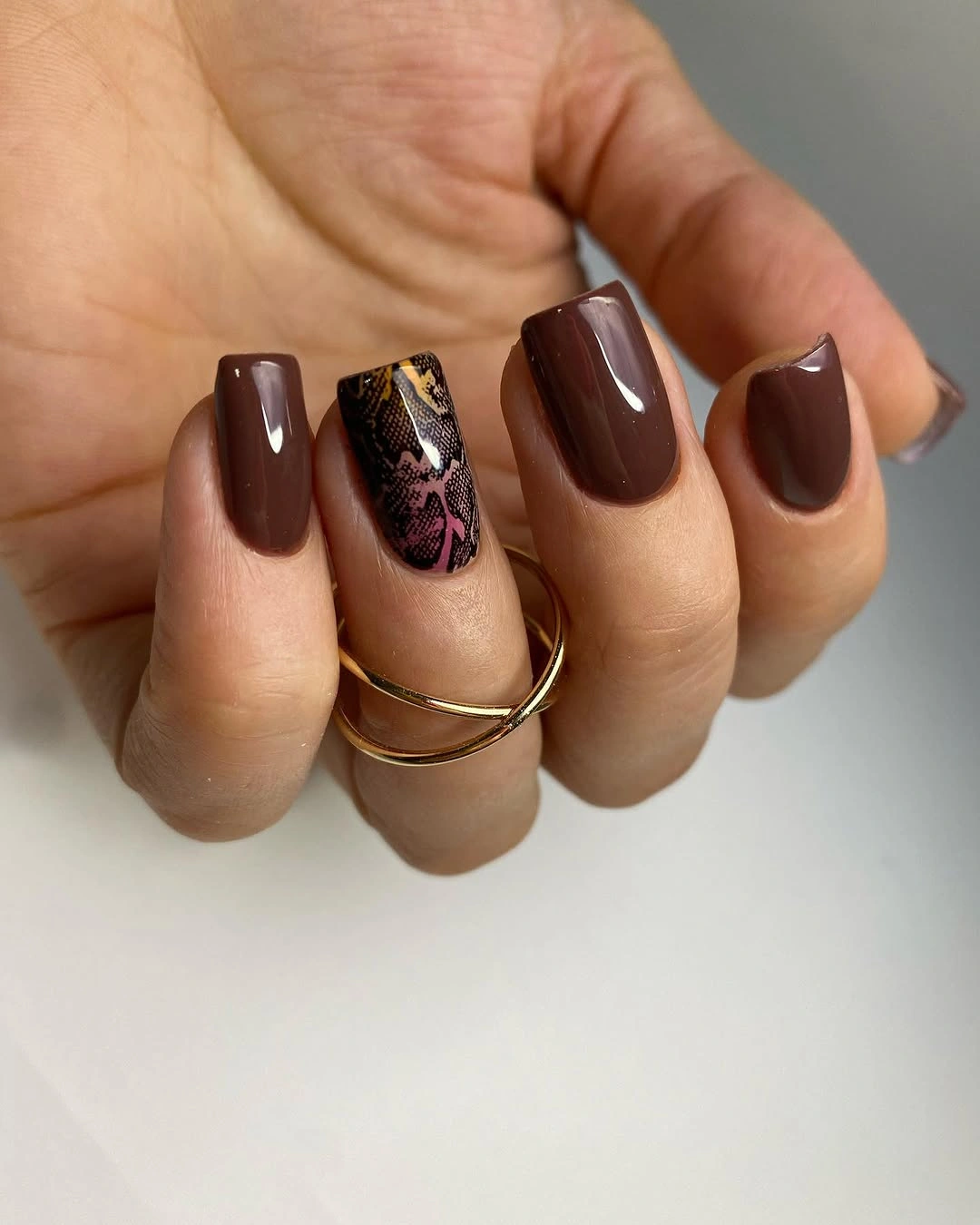 Long almond cocoa nails with creamy mauve accent sections