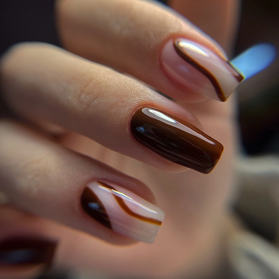 Long almond nails with brown burgundy cream diagonal accents