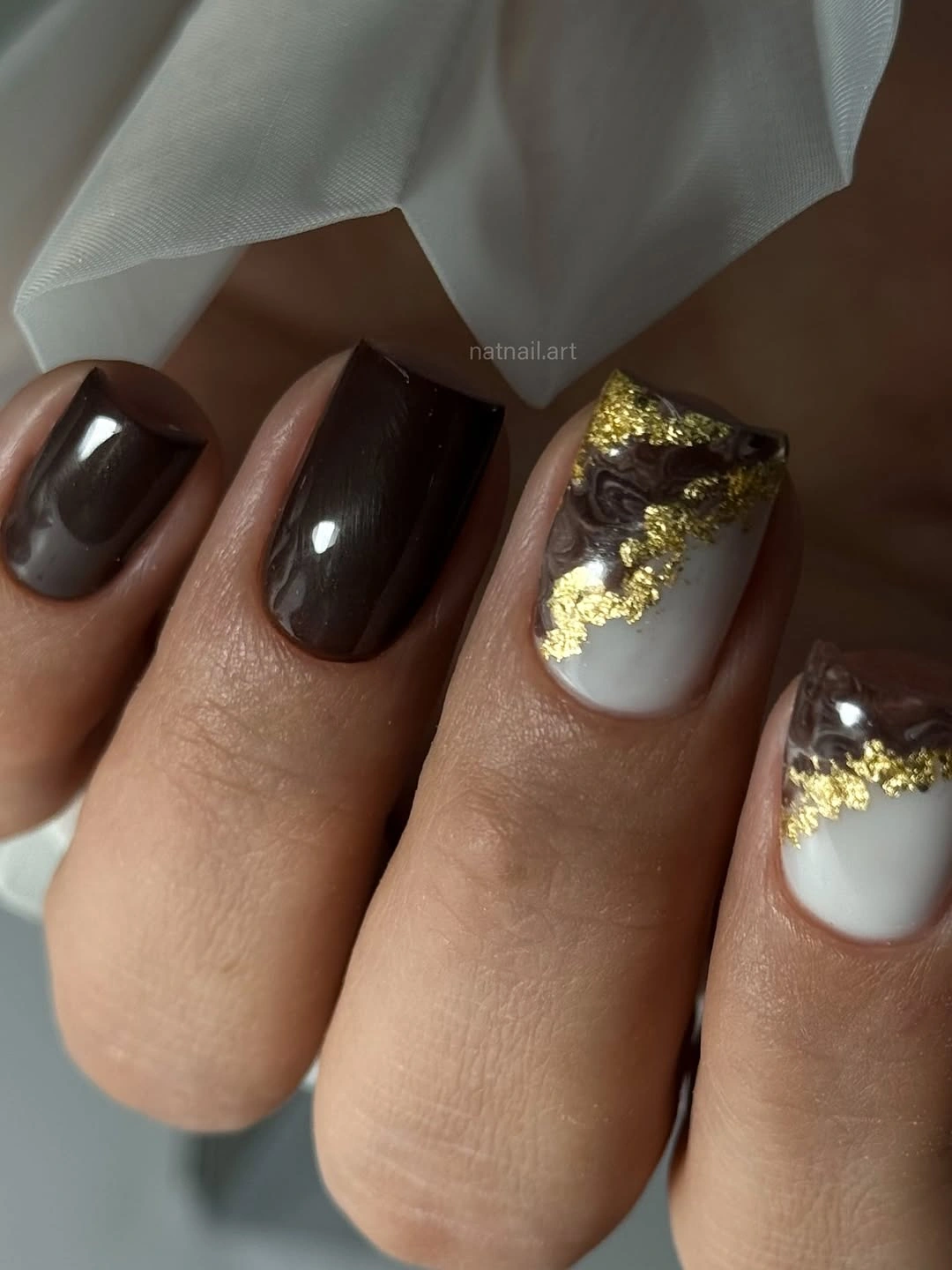 Medium brown square nails with white and gold foil accent