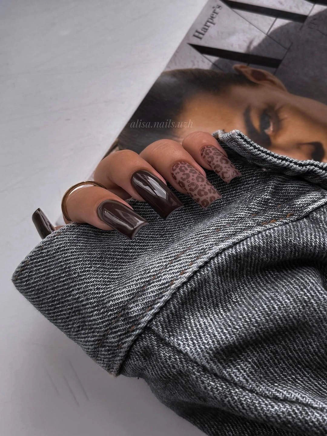 Long square nails with glossy chocolate solids and brown spots