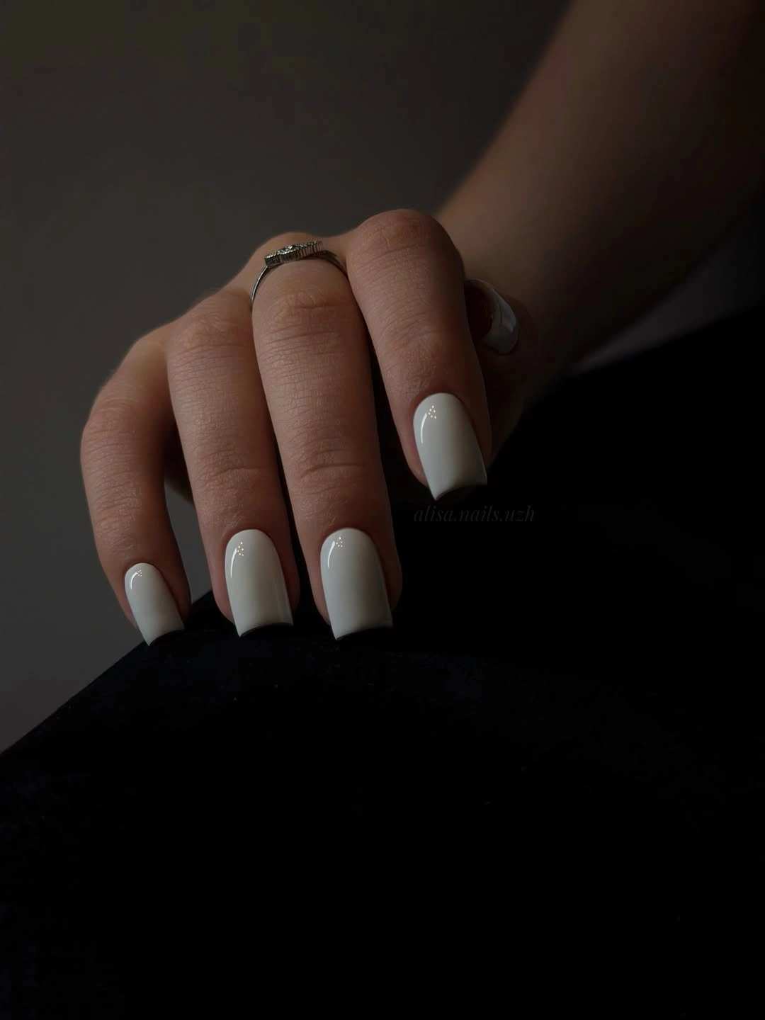 Short square nails in glossy creamy white polish