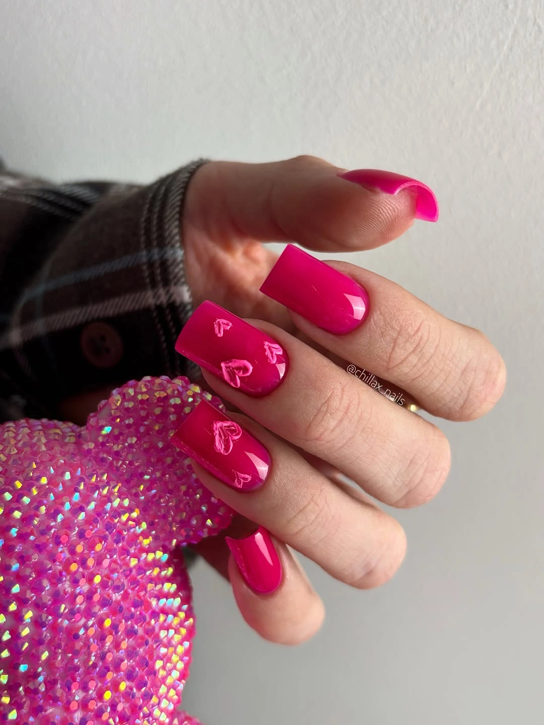 Long almond nude nails with continuous champagne-like sparkle