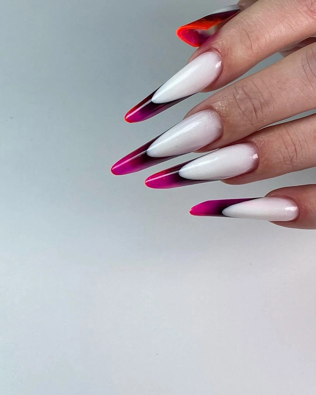 Long white nails with magenta side French edges