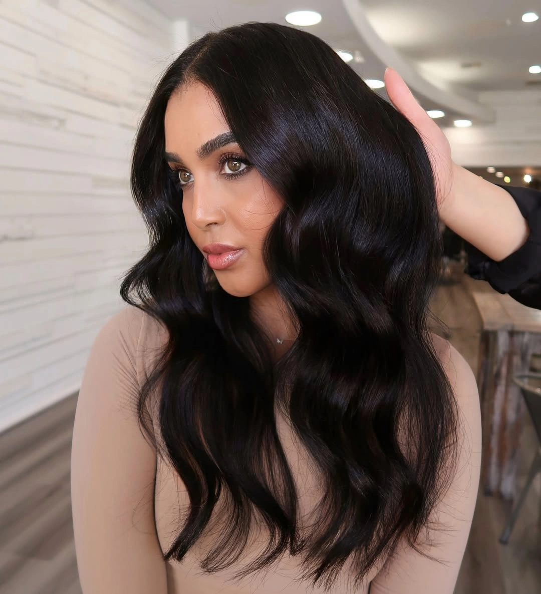 Very long glossy deep brown waves with a near-black interior
