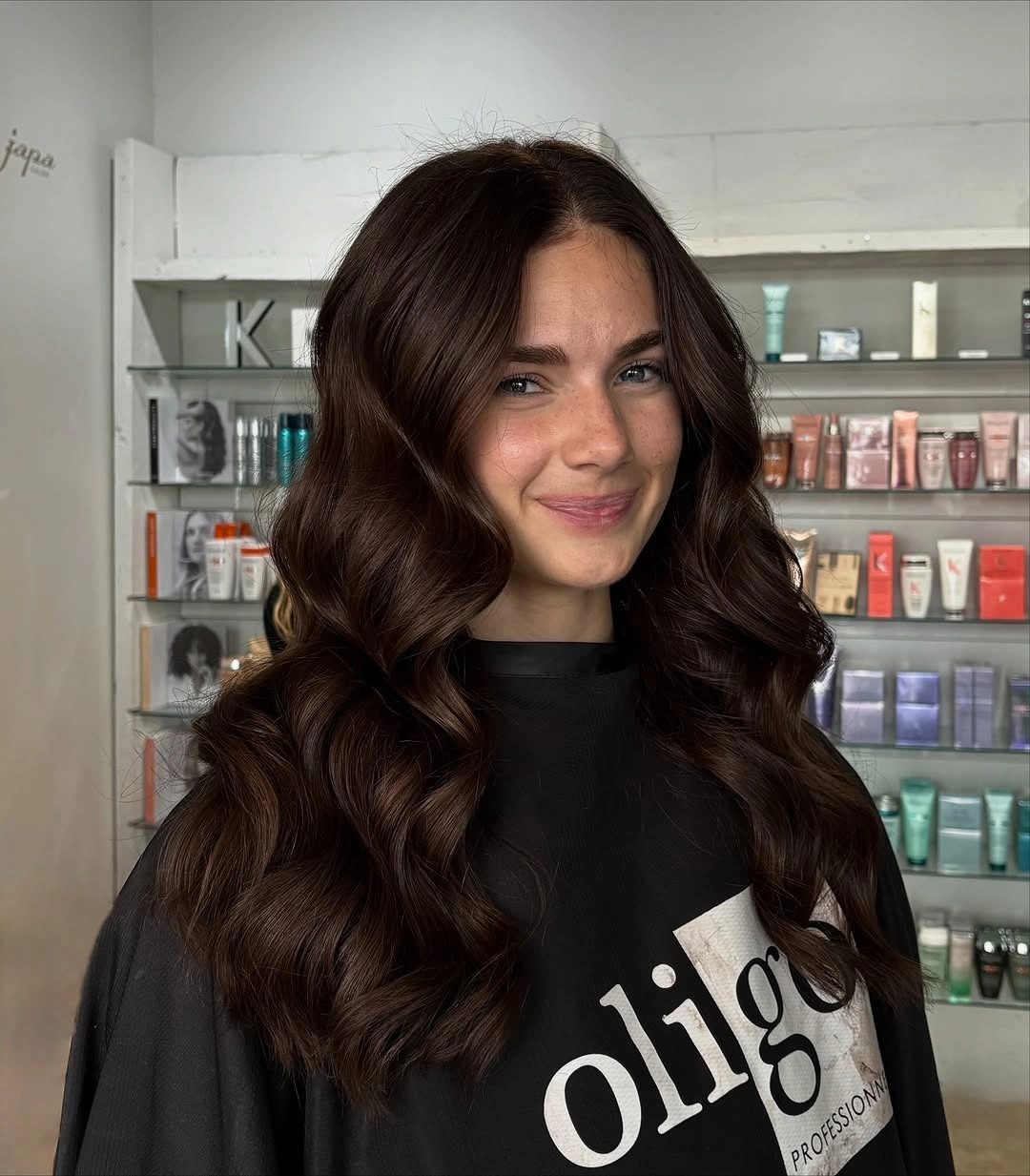 Medium-to-long rich chocolate waves with gentle warm variation