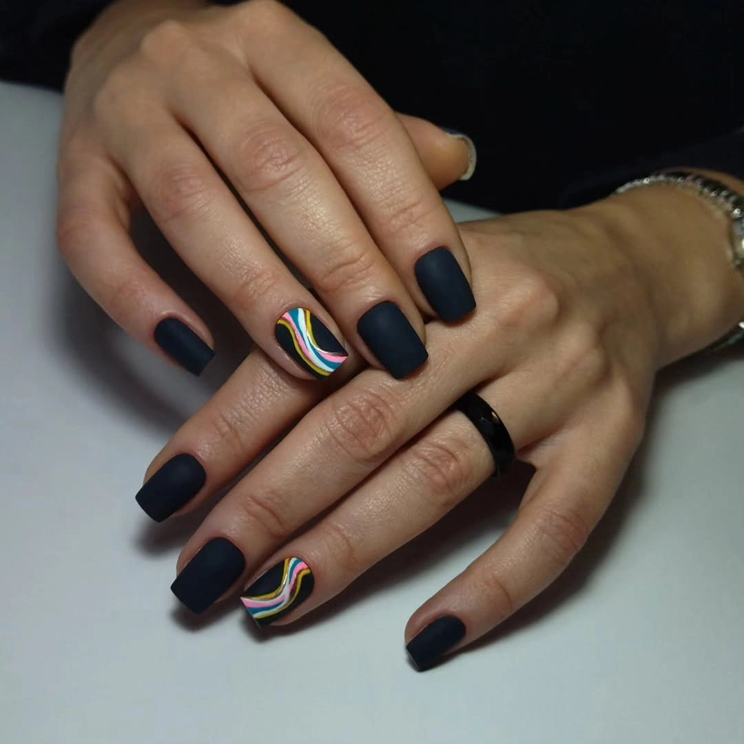 Matte navy square nails with tiny blue green yellow and pink curves